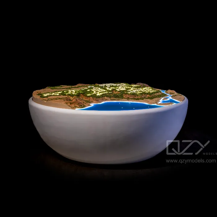 0T8A2550 Full architectural master plan model on display showing entire development layout including buildings, roads, and landscape design