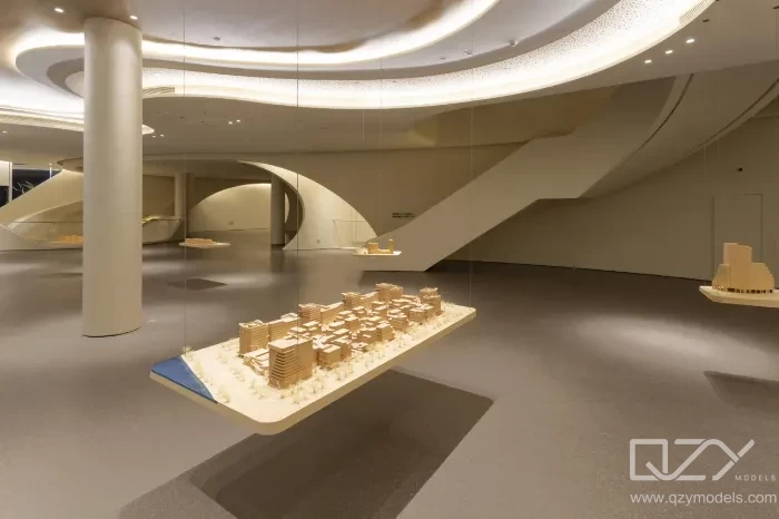 Architectural Scale Model in Modern Presentation Boardroom High-end physical architectural scale model displayed in illuminated boardroom