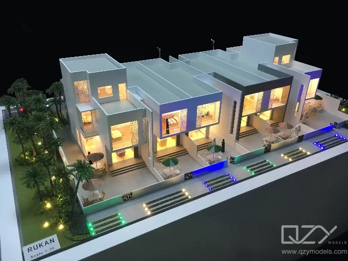  A residential scale model incorporating affordable and market-rate housing typologies, displayed during a local authority partnership presentation.