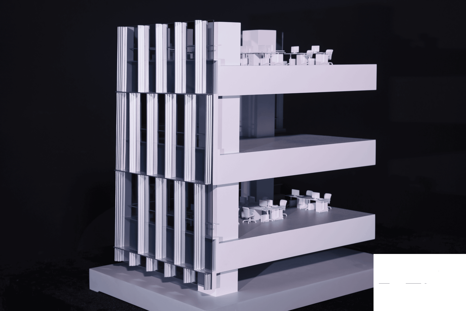 A sectional scale model of a high-rise tower revealing internal floor plate configuration, core positioning, and structural elements.