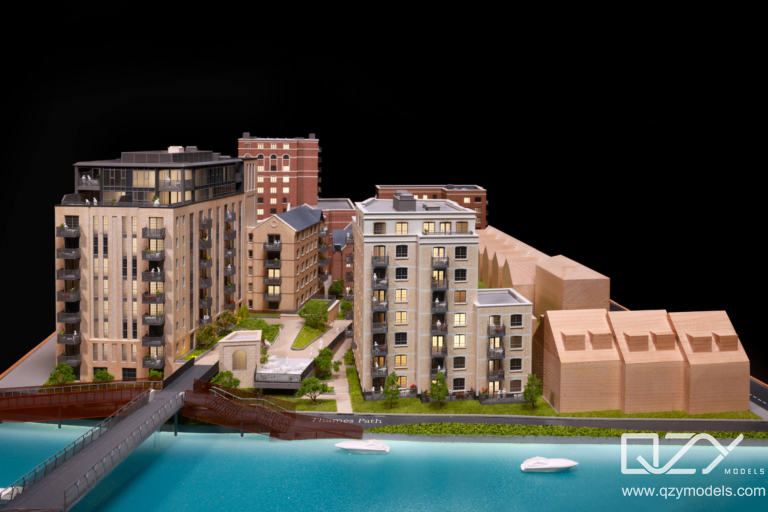 LED enabled residential model Smart LED-enabled residential scale model showing apartment availability and unit locations during a VIP sales presentation.