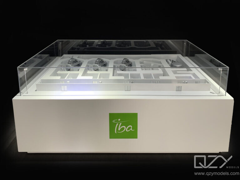 Precision physical scale model of cancer radiotherapy linear accelerator with gantry and treatment table
